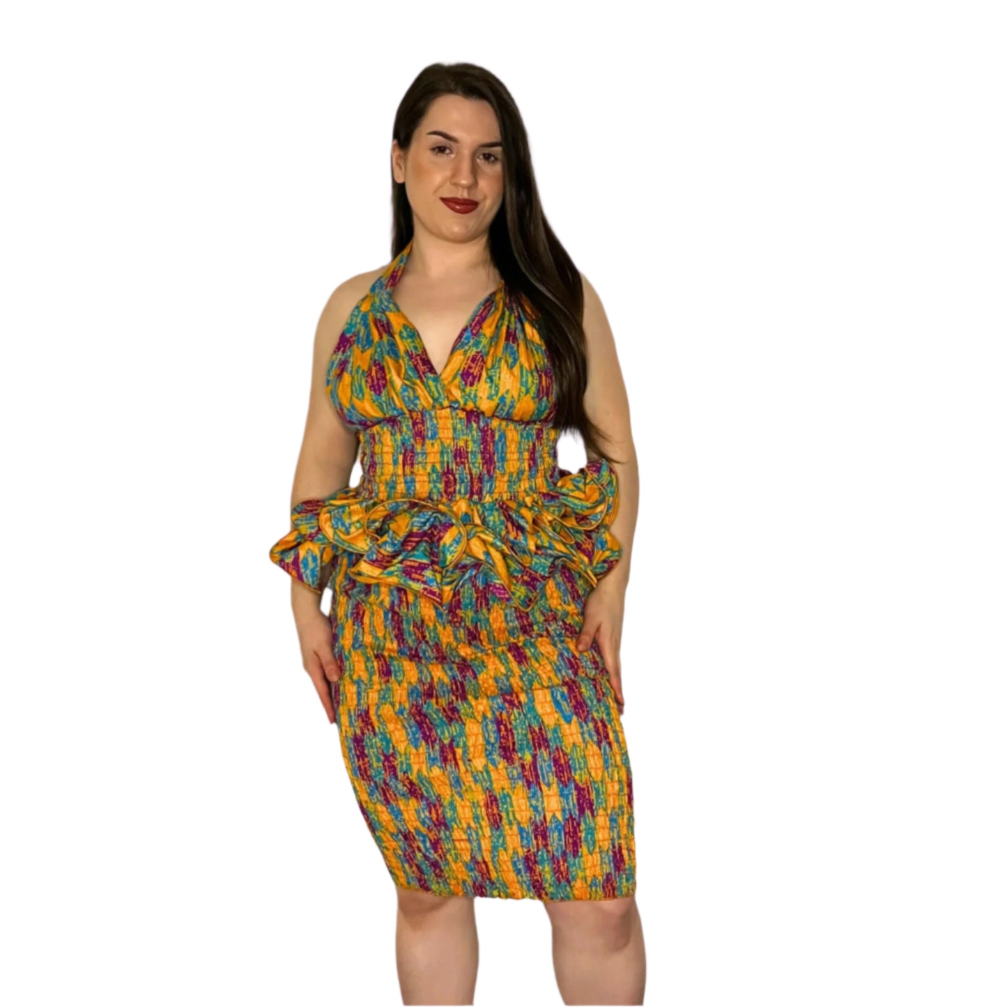 A model wearing a multicolor halter neck top and shirred skirt.
